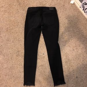 Black fringe jeans with holes